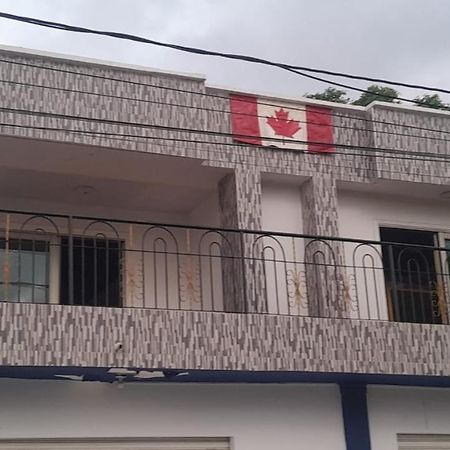 Canadian House Tolu Hotel Exterior foto